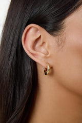 About Business Earrings Gold