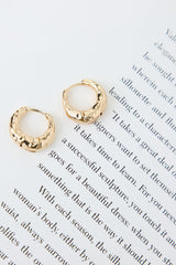 About Business Earrings Gold